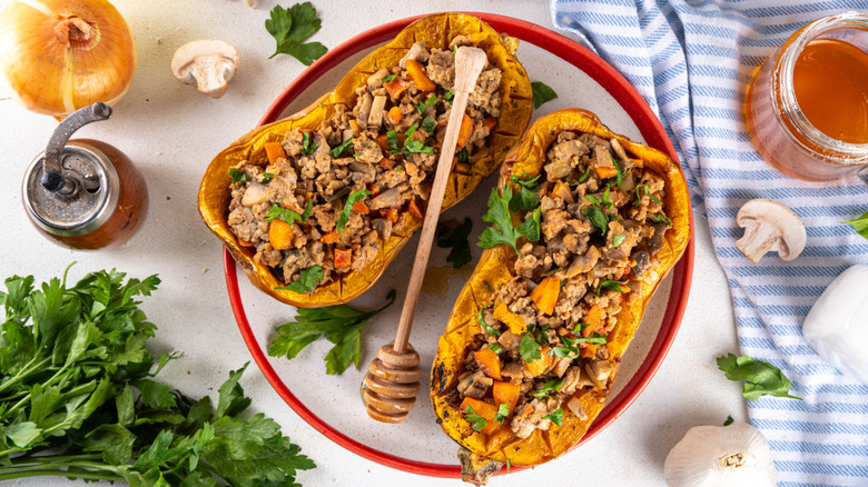 baked squash with stuffing made of ground beef and vegetables