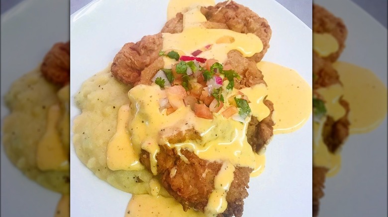 Chicken-fried steak with queso gravy