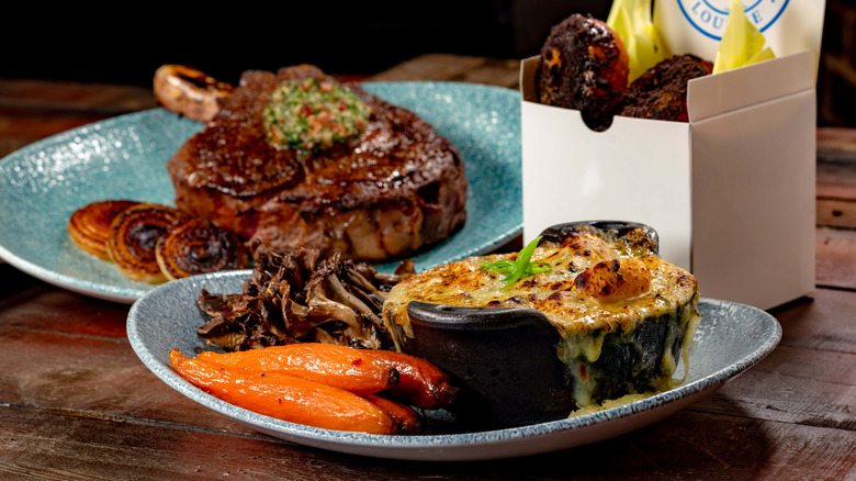 Disney ribeye steak with sides