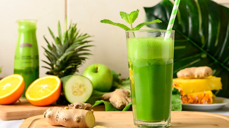 green juice on cutting board