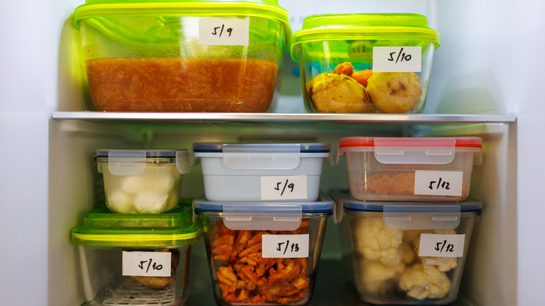 Fridge shelves of leftovers