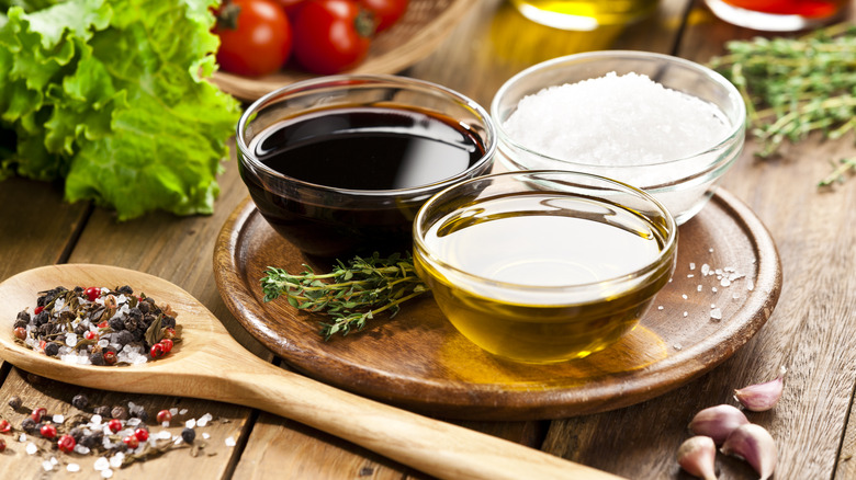 Salad ingredients on wooden table