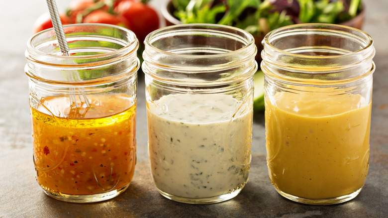 Three dressings in mason jars