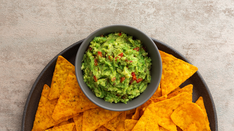 Bowl of guacamole with chips