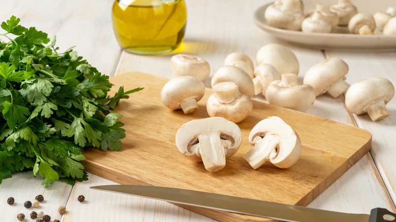 Mushrooms on cutting board