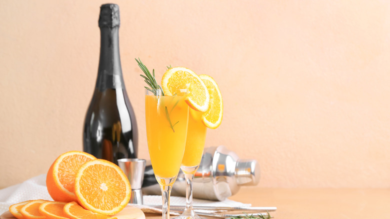 mimosas with bottle of sparkling wine