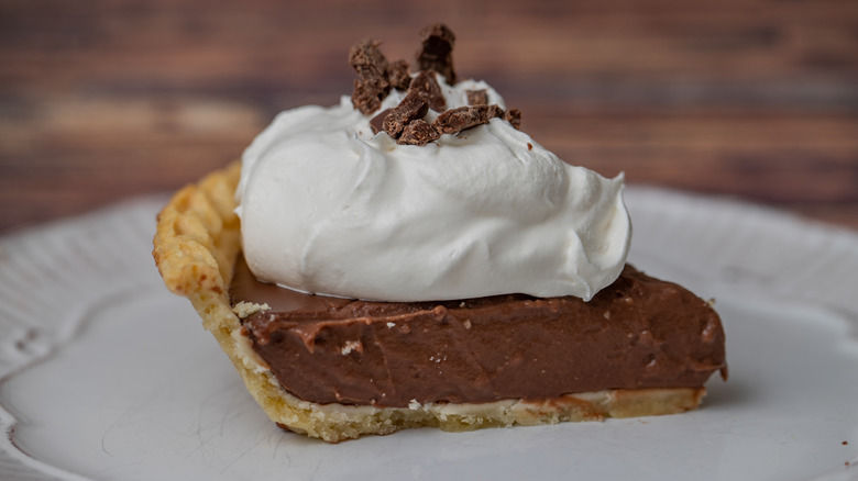 slice of chocolate cream pie on a plate