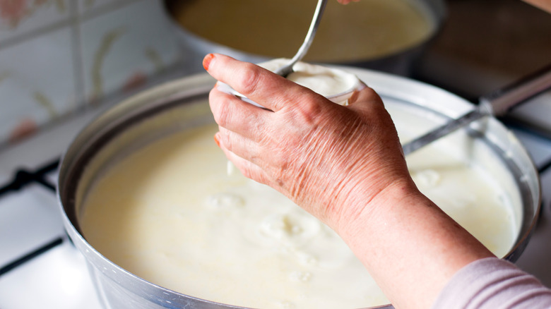 Person making yogurt