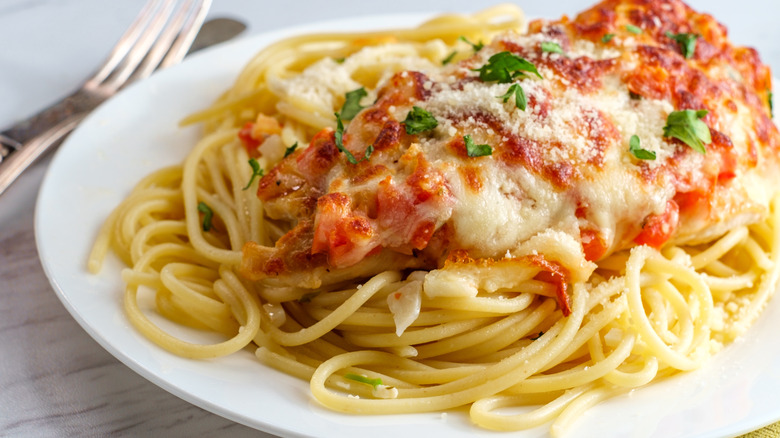 Chicken Parmesan over pasta