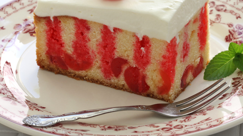 Slice of white cake with red coloring