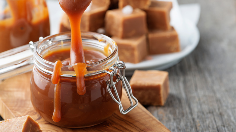 A jar of caramel sauce