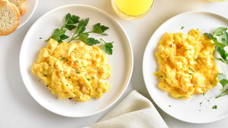 plates of scrambled eggs