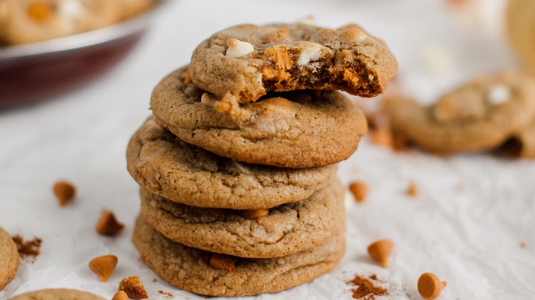 A stack of pumpkin spice white chocolate butterscotch cookies