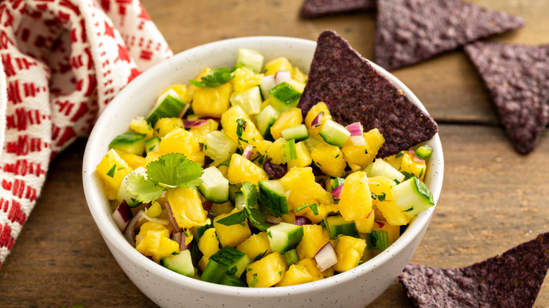 Bowl of mango salsa with tortilla chips