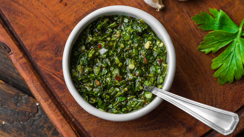 Chimichurri sauce in a ramekin