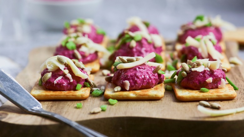 Beet hummus on crackers