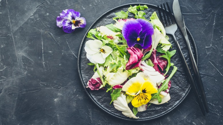 Mixed greens and edible flowers salad