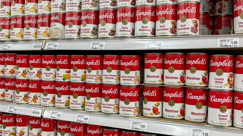 shelves with cans of campbell's soup