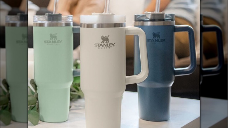 stanley tumblers on table