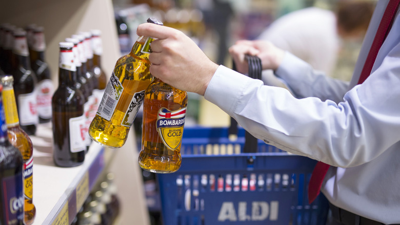 Man holding two bottles of beer