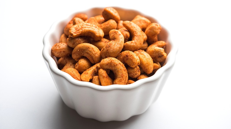 Spiced cashews in white bowl