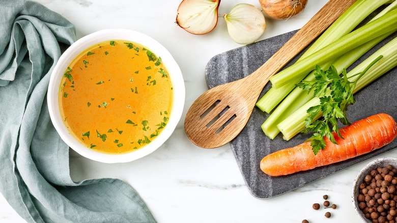 Broth on table with ingredients