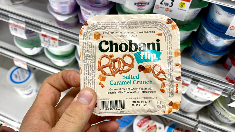 Person holding Chobani flip pack