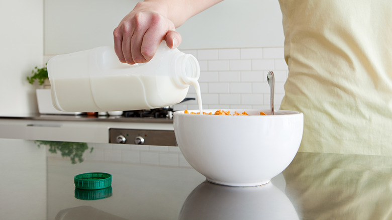 Milk poured over cereal