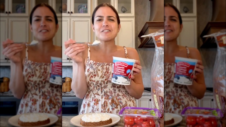 Steph Grasso holding Aldi cottage cheese