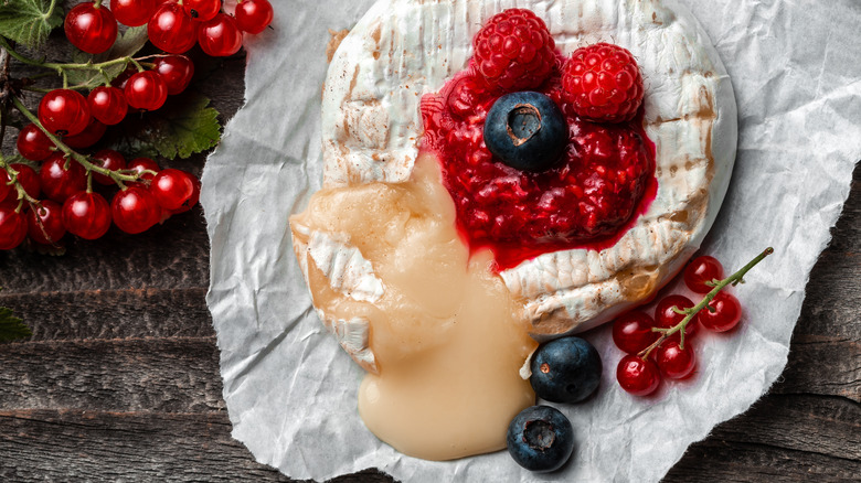 Baked brie topped with berries