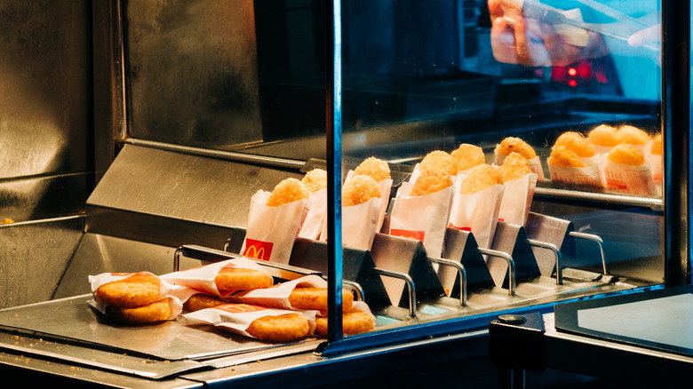 hash browns under warming lights