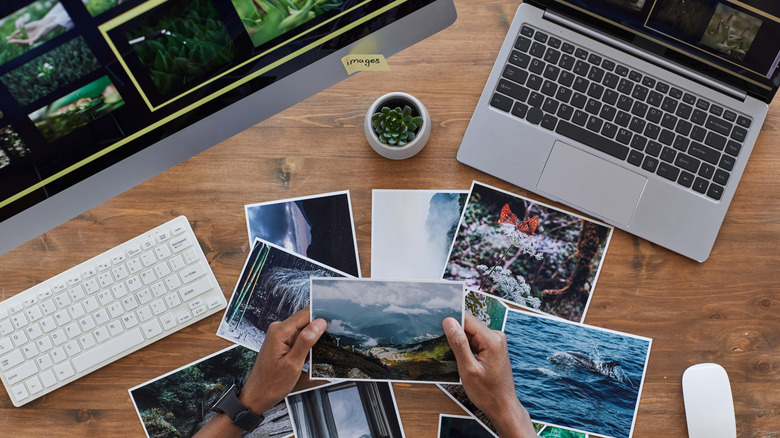 Printed photos on a desk