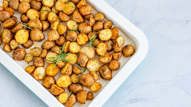 Crispy roasted potatoes on a tray