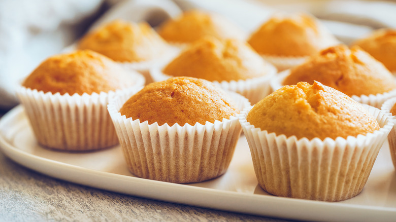 unfrosted cupcakes on white plate