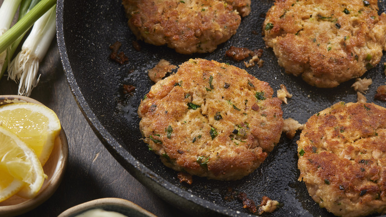 crab cakes in a pan