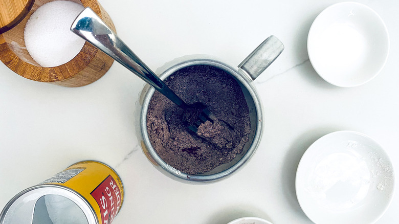 mixing dry mug brownie ingredients