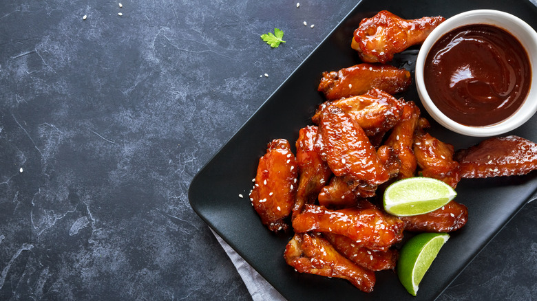 chicken wings on black plate