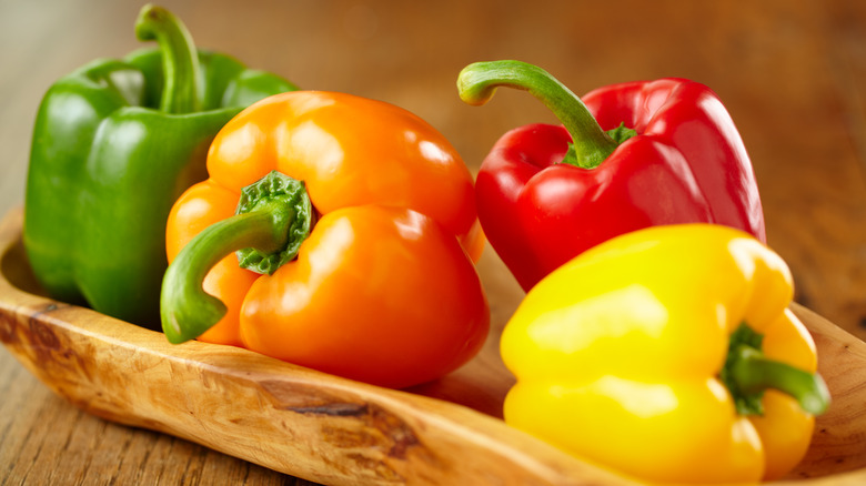 Colorful bell peppers, green, yellow, orange, red