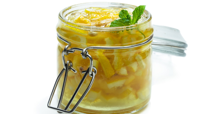 Chopped preserved lemons in jar