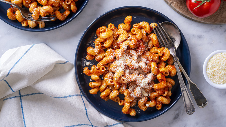 Cavatappi pasta in sauce with cheese