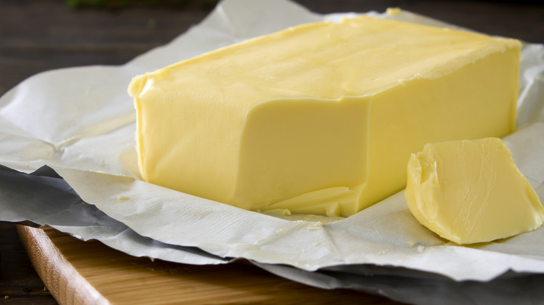 Block of Irish butter on wood board