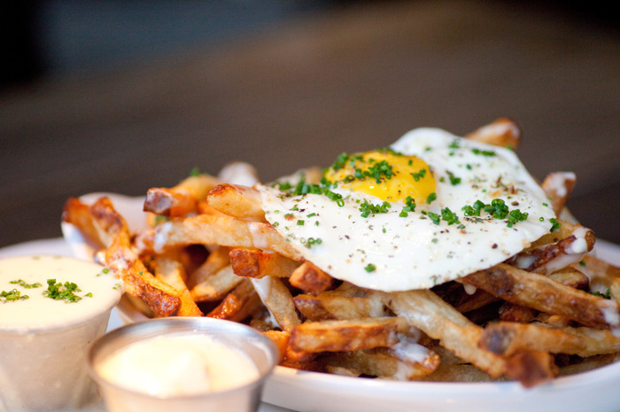 8. Crispy Fries with Mornay Sauce, Garlic Aioli, and a Farm-Fresh Fried Egg — Au Cheval, Chicago, Ill.