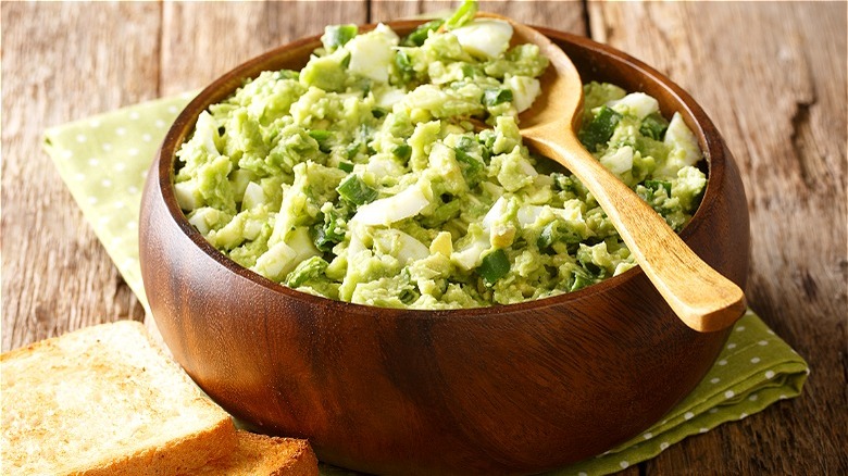 Avocado egg salad in bowl 