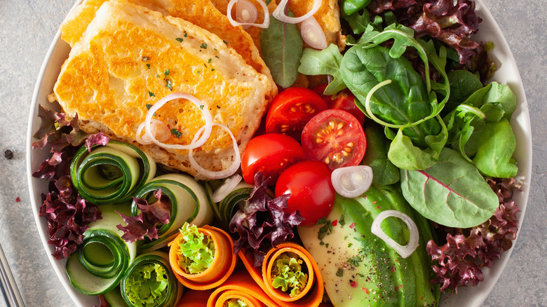 Peeled vegetables wrapped into a salad