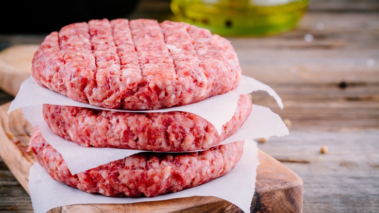 raw burger patties