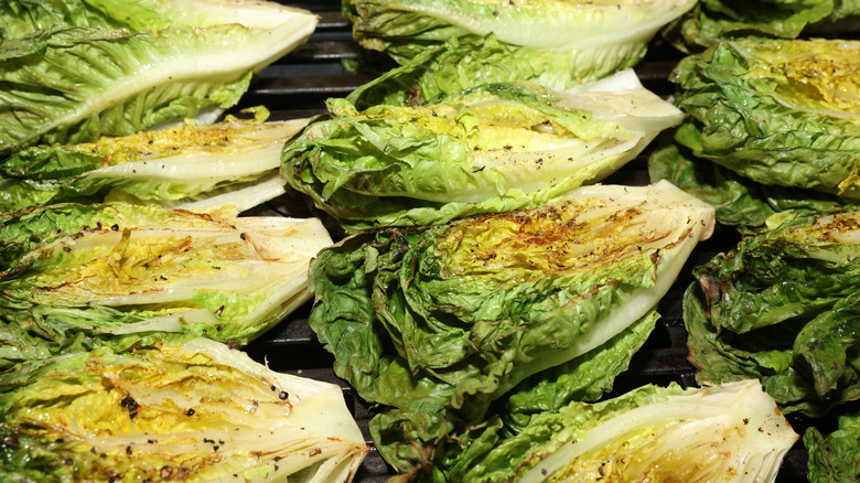 Woman grilling vegetables