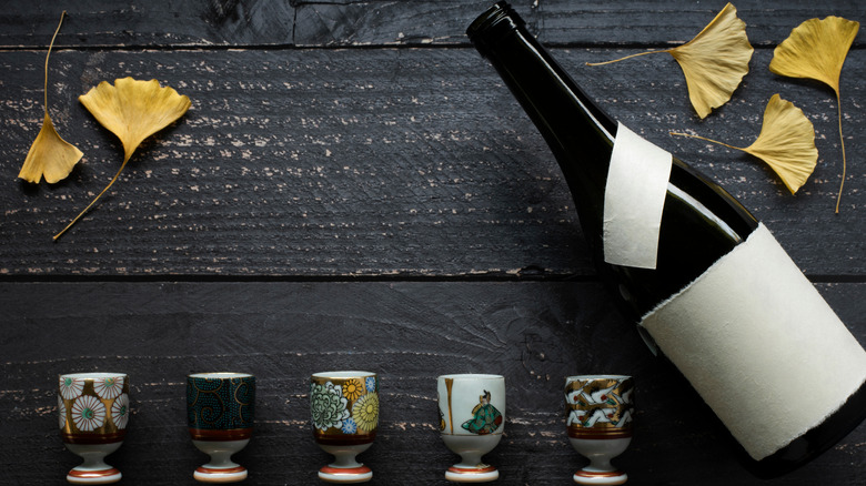 sake bottle with painted glasses