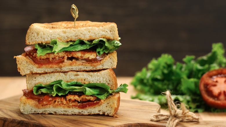 stacked halves of a BLT sandwich