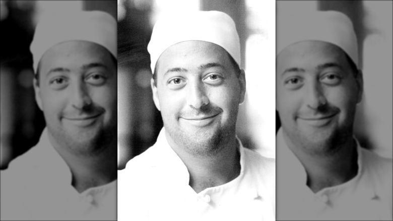 Andrew Zimmern in chef outfit