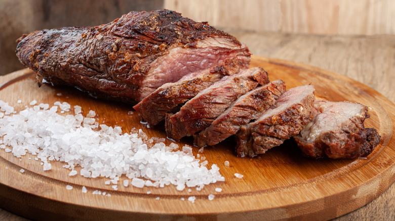 juicy steak slices with coarse salt